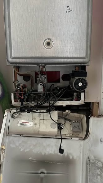 Boiler and connected pipework pictured in an L2R installation post